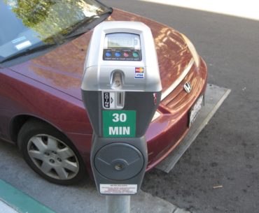 red-car-street-parking-on-berkeley-street-meter